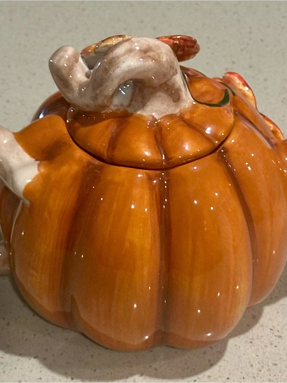 Glossy Orange Ceramic Pumpkin Teapot  with Green Vine Accent and Lid